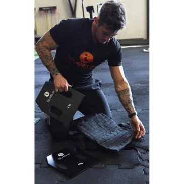 Plaque acier avec poignées 4 kg x2 de Sveltus pas cher - Nutriwellness