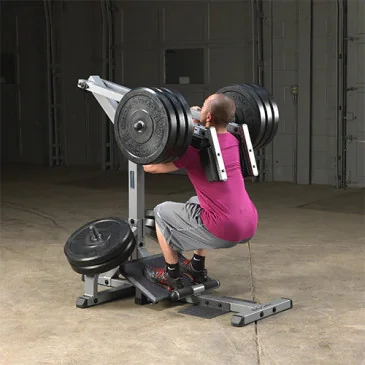 Poste squat et mollets charges manuelles de Body-Solid - Nutriwellness