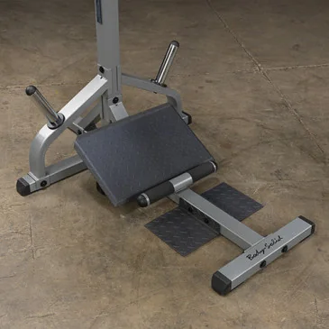 Poste squat et mollets charges manuelles de Body-Solid - Nutriwellness